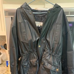 Black faux leather jacket with elastic waste and hood
